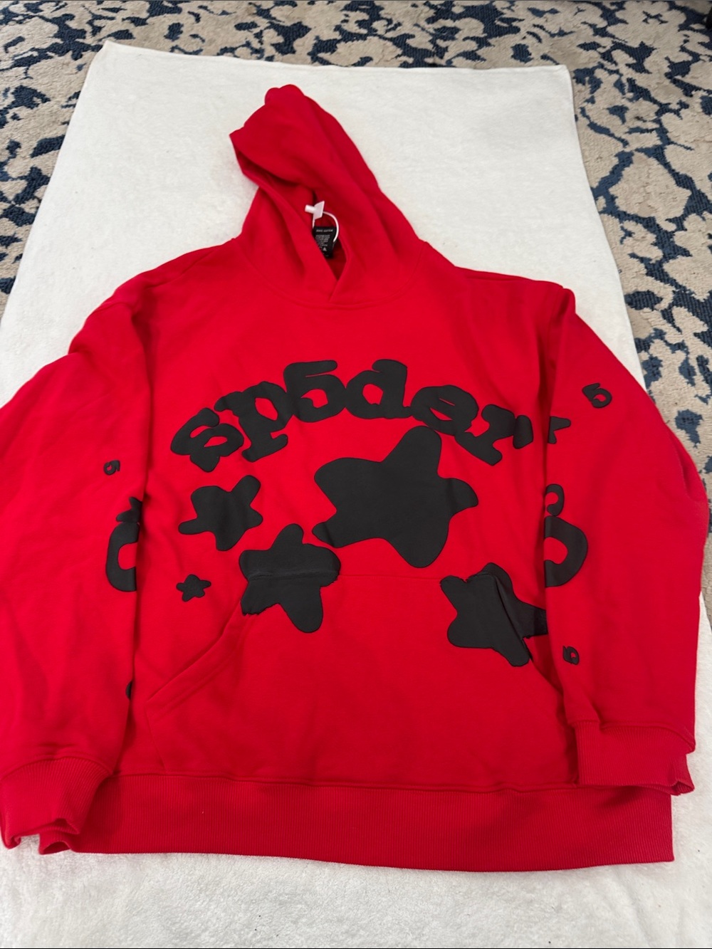 Red Graphic Hoodie Sweatshirt with Black Star Motif
